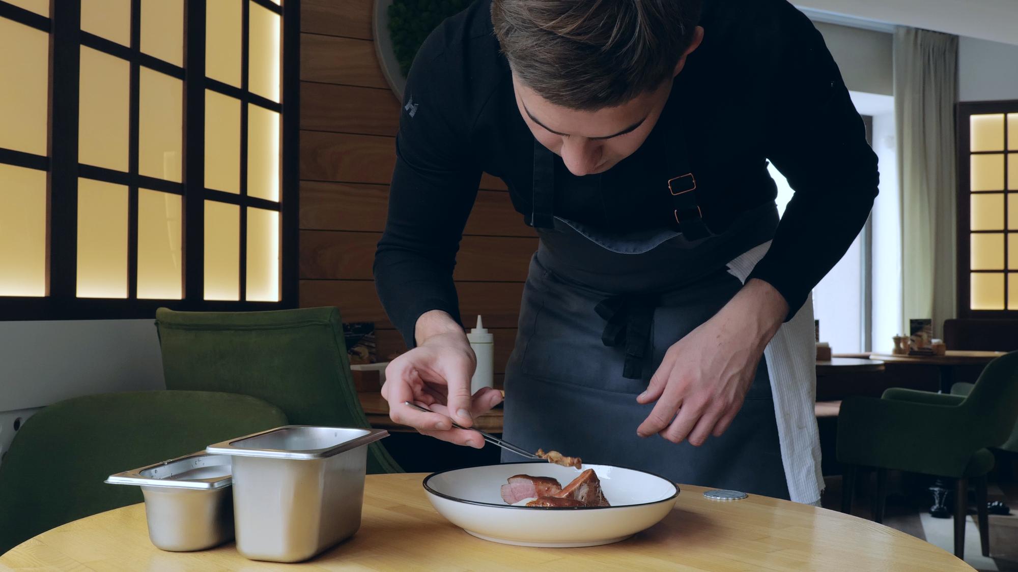 Chef arranging a bespoke tasting menu